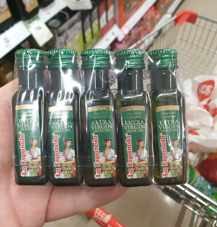 Coles Need To Get It Together. A "New" Pointless Plastic Product. 5 Individual Plastic Bottles Wrapped In Plastic