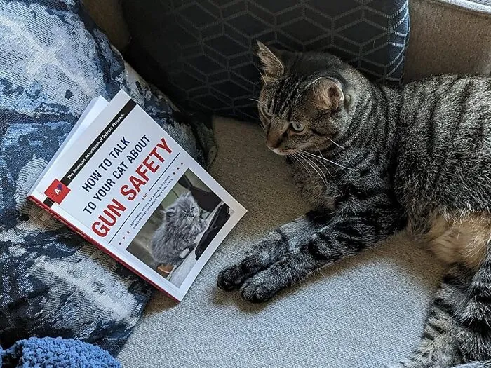 Share The Purr-Spective With <a Style="Display:inline;" Href="Https://Www.amazon.com/How-Talk-Your-About-Safety/Dp/045149492x?pd_rd_w=mhzap&content-ID=amzn1.sym.f5df7e34-0b7b-4623-B833-4bc428eb1494%3aamzn1.symc.c0e3441f-E8db-463a-Beb3-B6fa76b89153&pf_rd_p=f5df7e34-0b7b-4623-B833-4bc428eb1494&pf_rd_r=xs5d6kp2bv22dtst26mw&pd_rd_wg=qo025&pd_rd_r=aea5cebb-2430-47b5-Bb0b-581fdbb3a27e&pd_rd_i=045149492x&linkcode=ll1&tag=bpkangaroo-20&linkid=d703a3761b1a4e6c2a19acfcd2b39072&language=en_us&ref_=as_li_ss_tl" Target="_blank"><span Style="Font:inherit;color:#d74b1f;"> 'How To Talk To Your Cat About Gun Safety'</Span> - A Very Serious Book That Packs A Punch(Line)