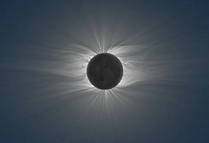 The Moon During A Total Solar Eclipse Revealing A Vast Solar Corona