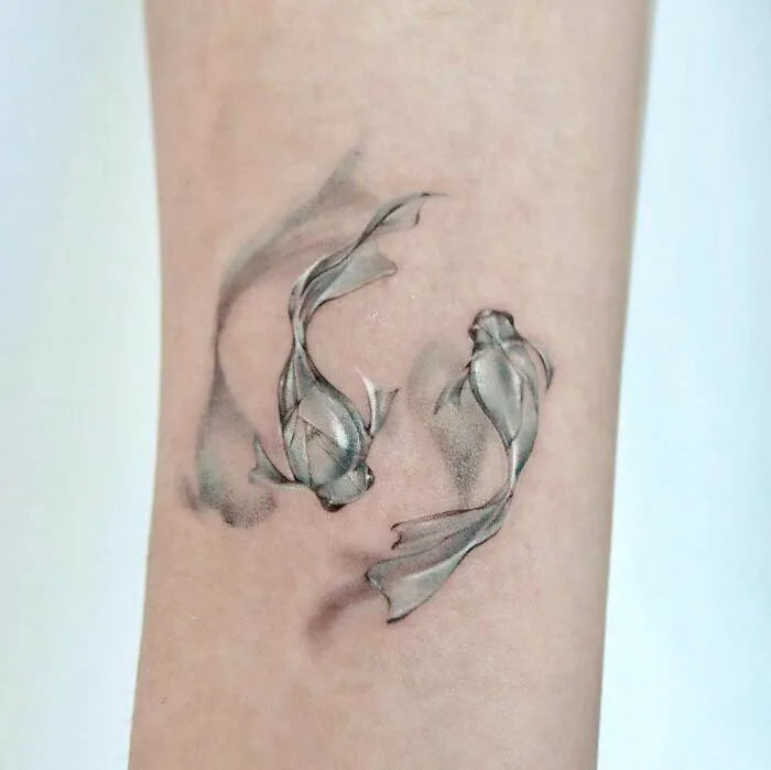 Blue Goldfish On The Wrist