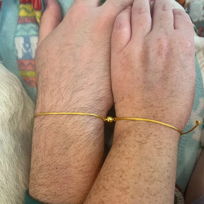 Invisible String Bracelets: Inspired by Taylor's Folklore song, crafted with gold satin-nylon cord and a magnetic charm that symbolizes an everlasting bond - a perfect pair to share with fellow Swiftie!