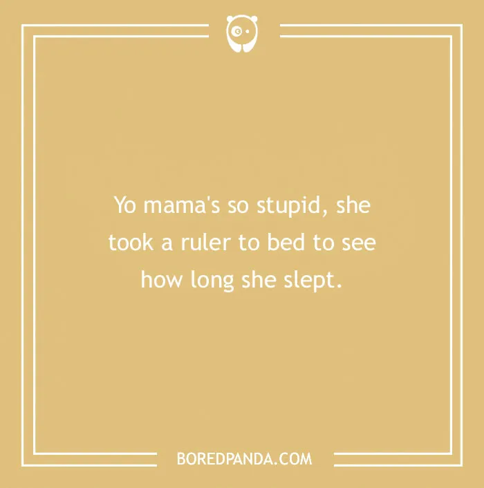 Yellow card with a "Yo mama" joke about sleeping with a ruler.