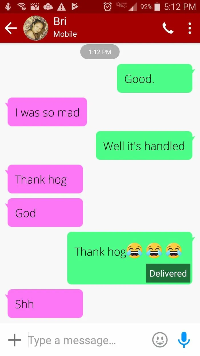 Text message conversation showing autocorrect errors with words like Thank hog instead of thank god in a messaging app.