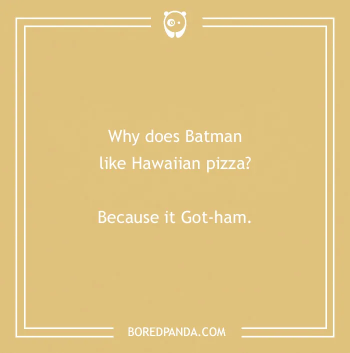 Batman joke about Hawaiian pizza on a tan background with text: "Why does Batman like Hawaiian pizza? Because it Got-ham."