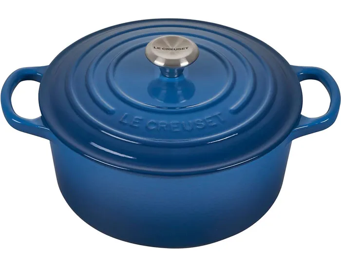 Le Creuset Enameled Cast Iron Signature Round Dutch Oven: Offers you shock-resistant enamel exterior, a non-stick and caramelization-friendly interior, and oven-safe stainless steel knob for high-temperature cooking.