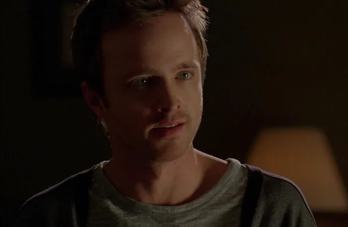 Jesse wearing gray shirt looking from Breaking Bad