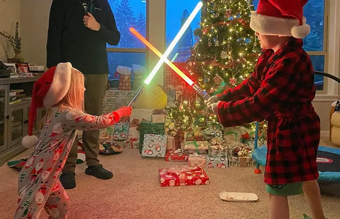 FX Lightsaber: Engage in realistic intergalactic combat with this high-quality, USB rechargeable lightsaber toy, perfect as a holiday gift for your young Star Wars fans.