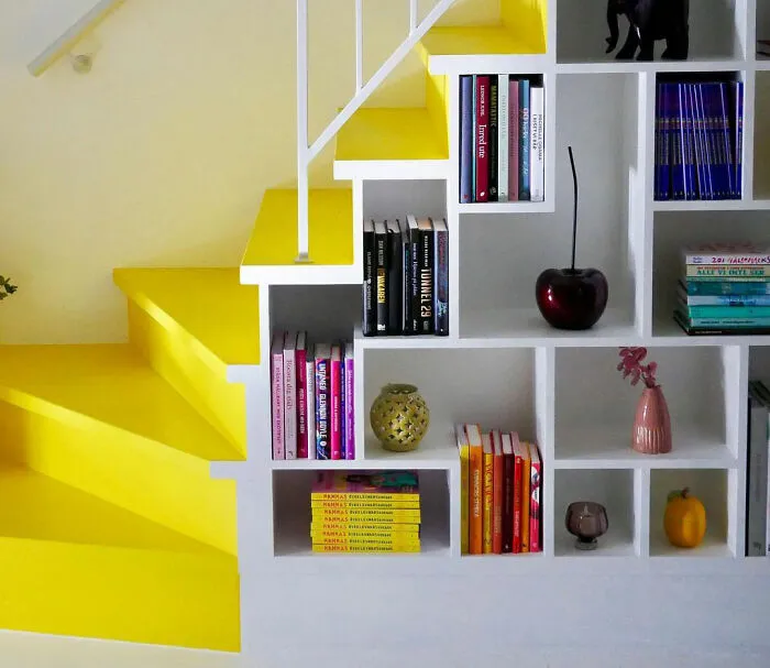 Sunny Hall With Yellow Staircase