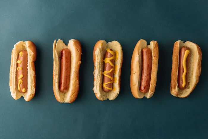 Hot dogns on the blue background 