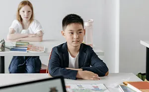 Teacher Pretends Insults From 12 Y.O. Student Are Compliments, Entertains Class But Makes Boy Cry