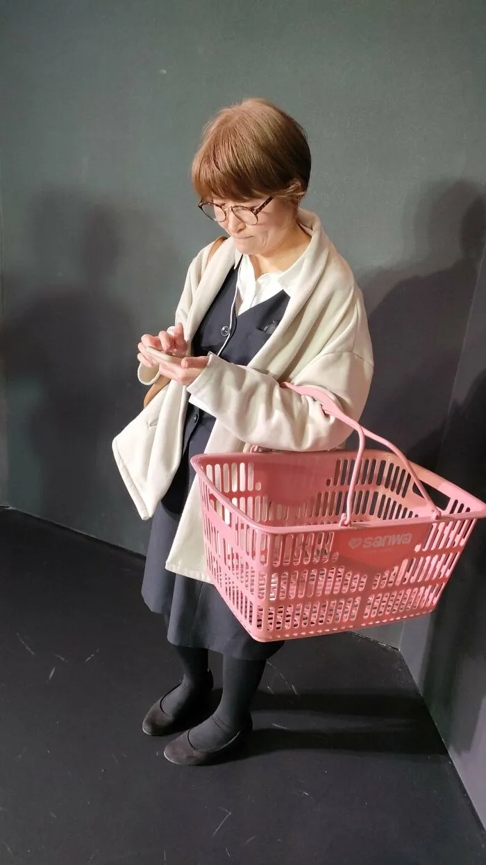 An Office Worker At The Supermarket In The Evening After Work