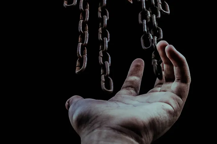 Fingers Grasping Freedom