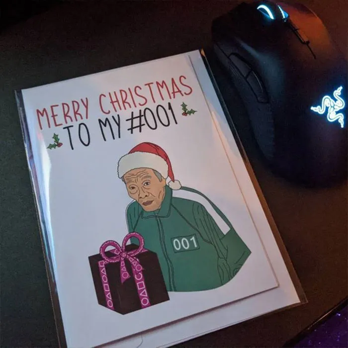 Deck The Halls With Laughter – This Funny Squid Christmas Card Is The Perfect Game Changer For Festive Cheer