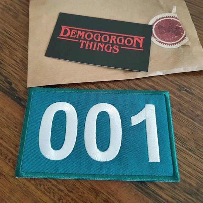 Sew On Major Fun With These Squid Game Number Badges - Let's See Whose Number Is Up At The Next Costume Party