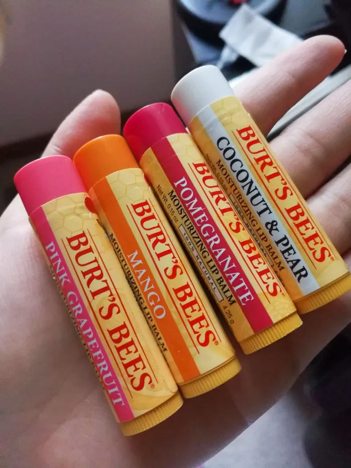 Burt's Bees Lip Balm: This pocket-size powerhouse is crammed with all-natural ingredients that moisturize, hydrate, and revitalize your lips effortlessly, making it your bag's new best friend.