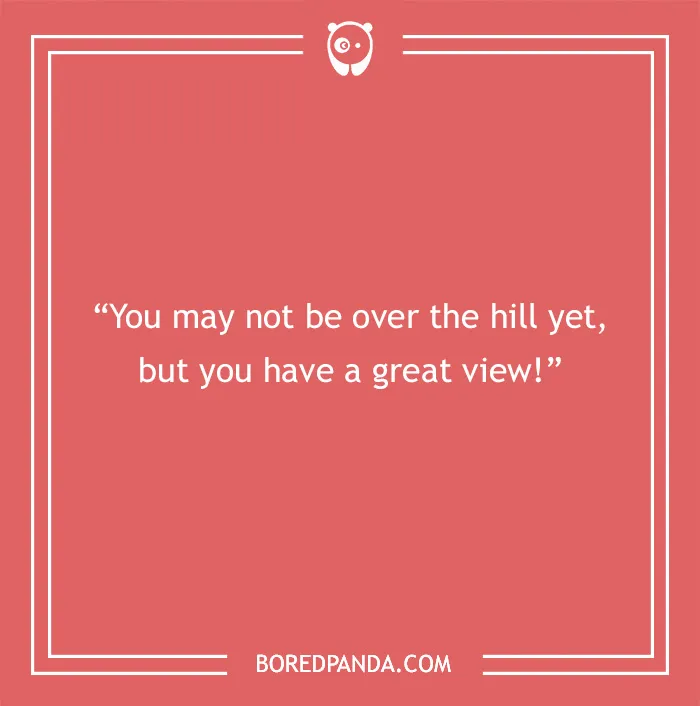Funny birthday saying on a red background: "You may not be over the hill yet, but you have a great view!"