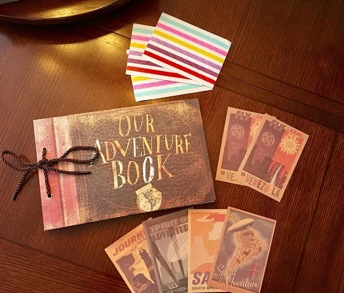 Our Adventure Book Pixar Up DIY Scrapbook: Jam-packed with cute postcards, stickers and more, making it a quirky, fun and adorable way to chronicle your shared escapades!