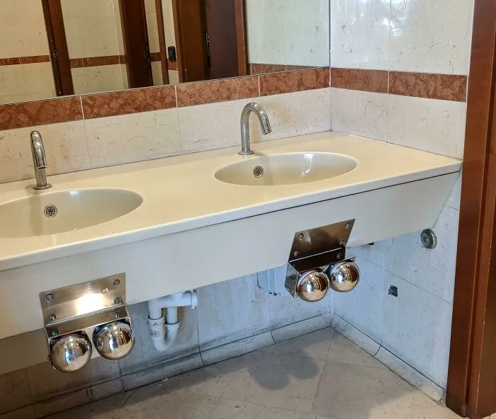 Knee-Activated Water Taps At A Supermarket, Italy