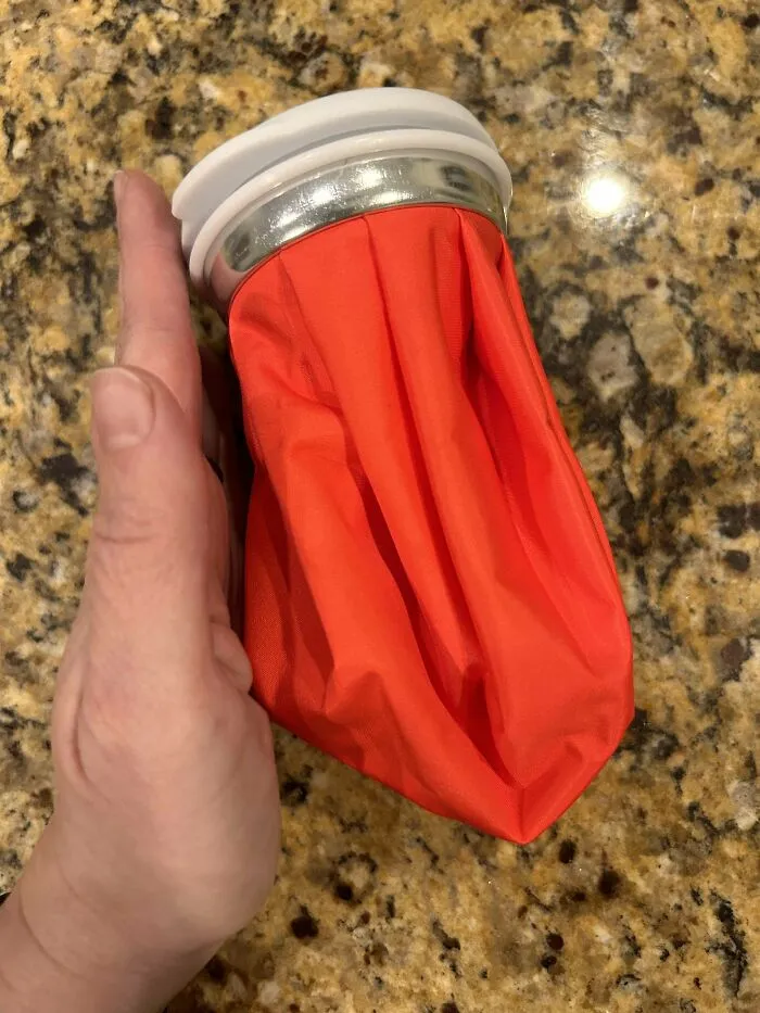 Promo Item I Received For Free At A Christmas Fair. It Is The Size Of My Hand, The White Top Screws On And Off And The Red Bag Part Expands And Is Pretty Thick