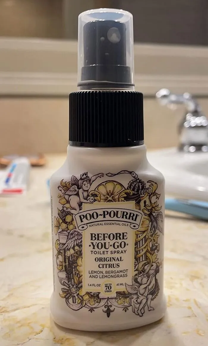 Citrus toilet spray, a budget-friendly Valentine's gift under $25, displayed on a bathroom countertop.