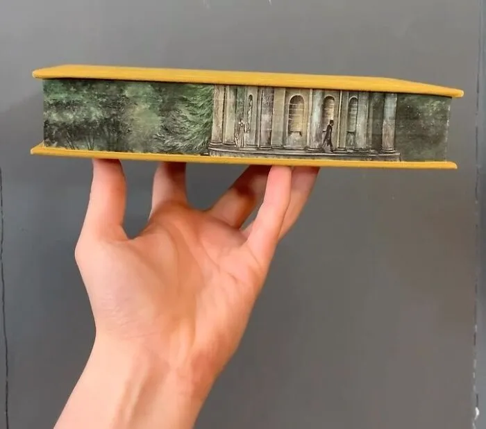 30 Magical Drawings On The Edges Of Popular Books Featuring Famous Scenes Done By This Artist