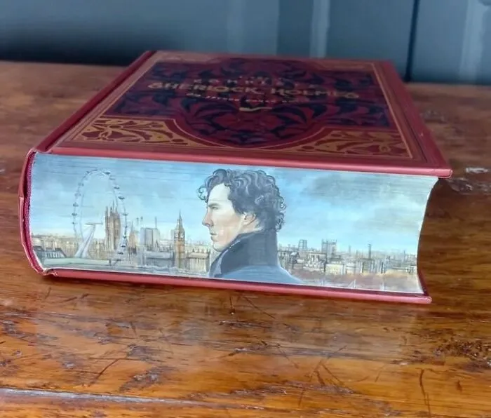 30 Magical Drawings On The Edges Of Popular Books Featuring Famous Scenes Done By This Artist