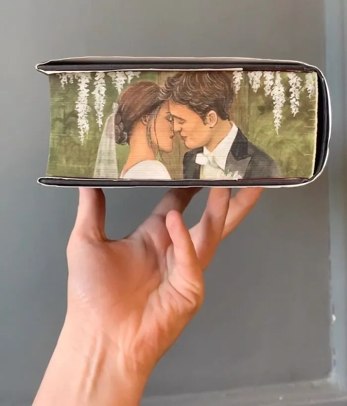 30 Magical Drawings On The Edges Of Popular Books Featuring Famous Scenes Done By This Artist