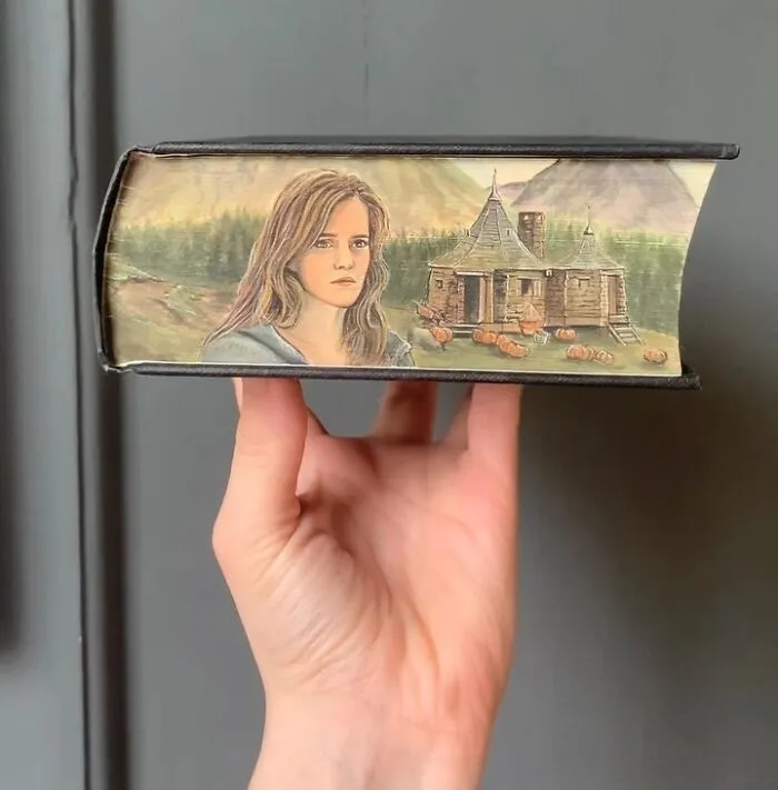 30 Magical Drawings On The Edges Of Popular Books Featuring Famous Scenes Done By This Artist