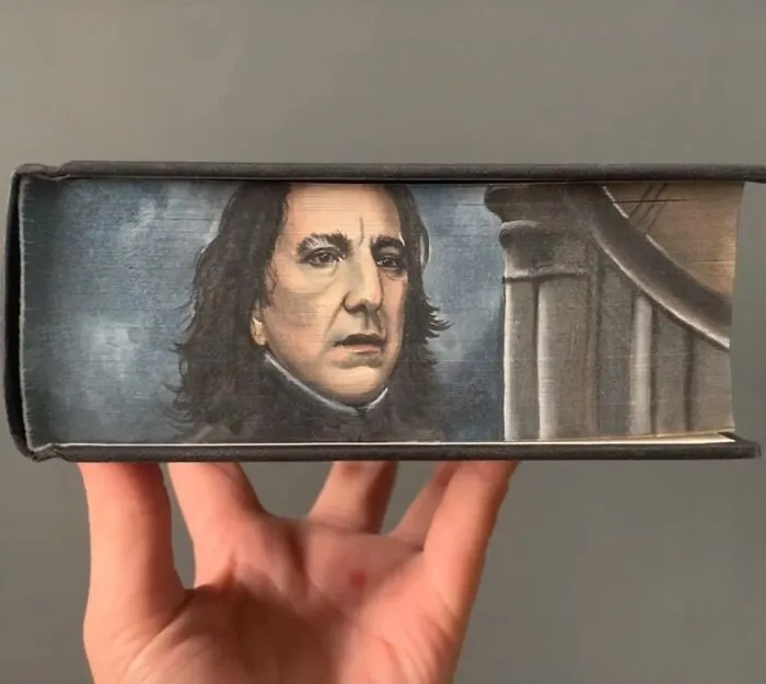 30 Magical Drawings On The Edges Of Popular Books Featuring Famous Scenes Done By This Artist
