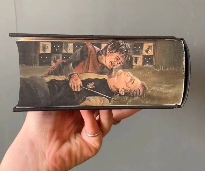 30 Magical Drawings On The Edges Of Popular Books Featuring Famous Scenes Done By This Artist