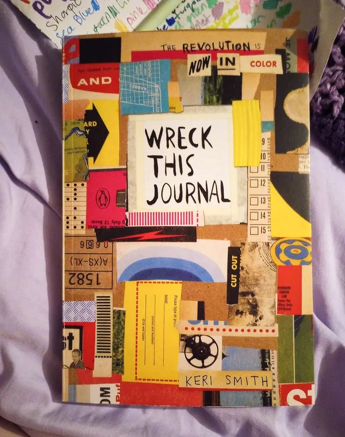 Creative "Wreck This Journal" with colorful collage on the cover, a budget-friendly Valentine's Day gift under $25.