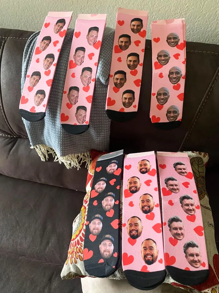 Fun Valentine's socks with faces and hearts, budget-friendly gift under $25.