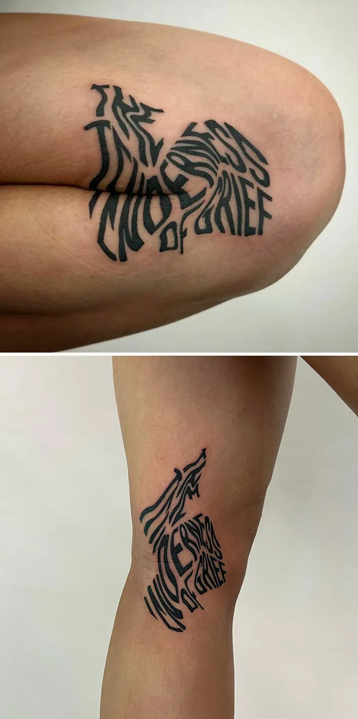 Creative tattoo with hidden meaning, text design forms a howling wolf silhouette on skin.