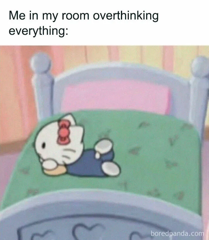 Introvert meme showing a cartoon character lying on a bed, captioned with "Me in my room overthinking everything."