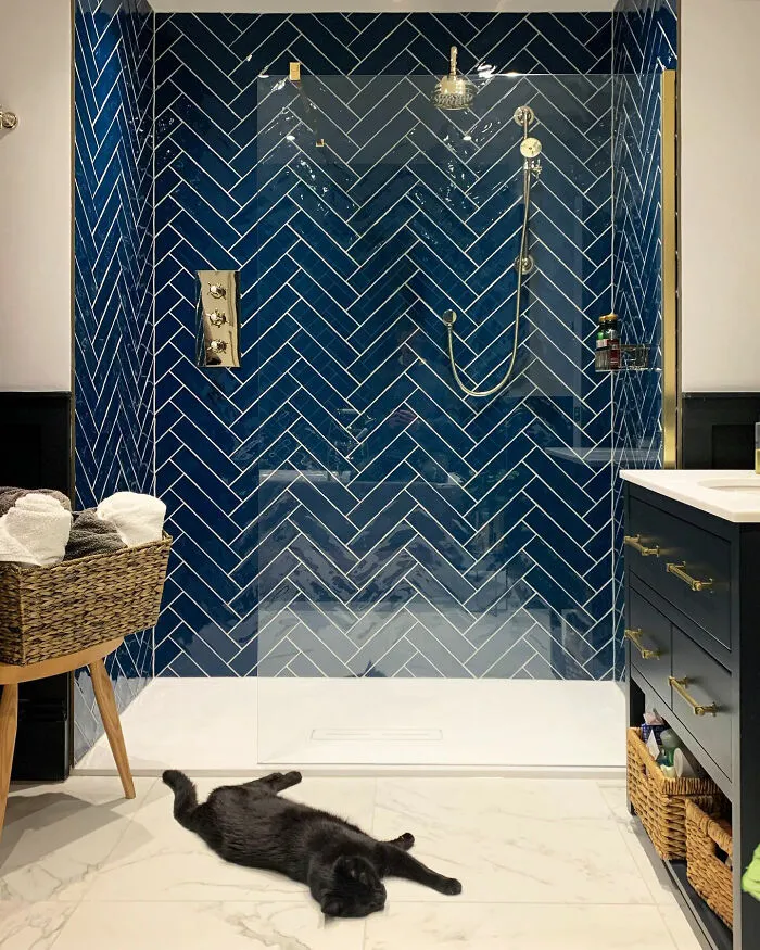 Walk-In Shower With Blue Herringbone Tiles