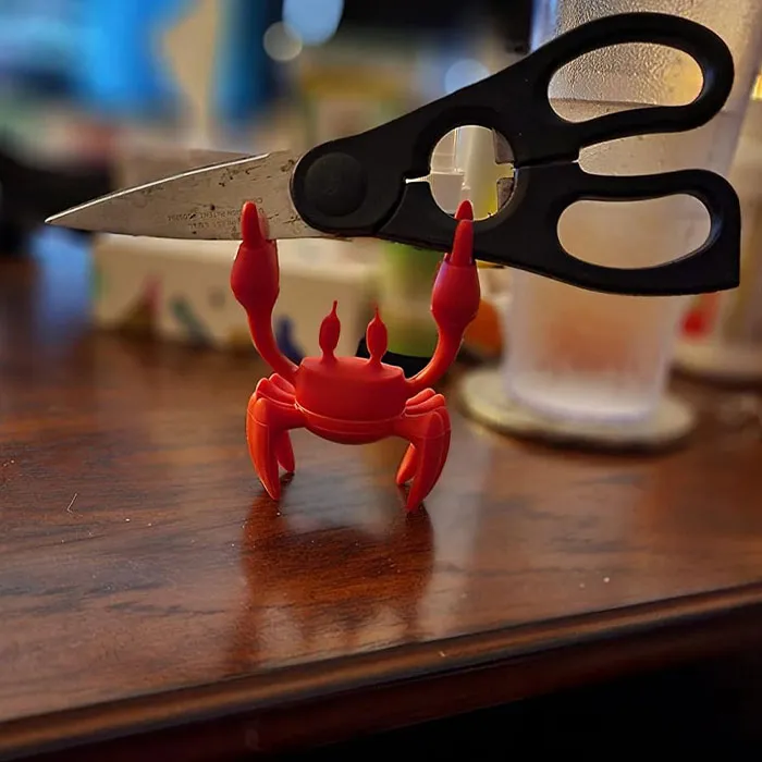 Add A Splash Of Whimsy To Your Kitchen With <span Style="Font:inherit;color:#d74b1f;"> OTOTO Red The Crab Silicone Utensil Rest</Span>: A Practical And Playful Spoon Rest For Stovetops