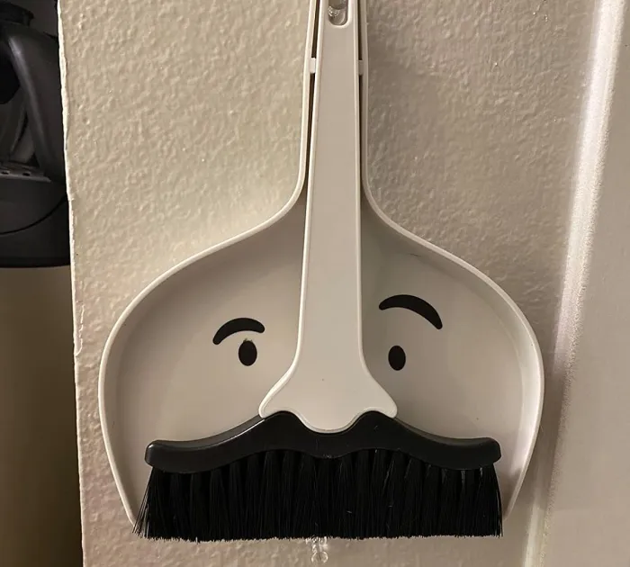<span Style="Font:inherit;color:#d74b1f;"> The Mini Mustache Dustpan And Brush Set</Span>: A Whisker Away From A Spotless Home