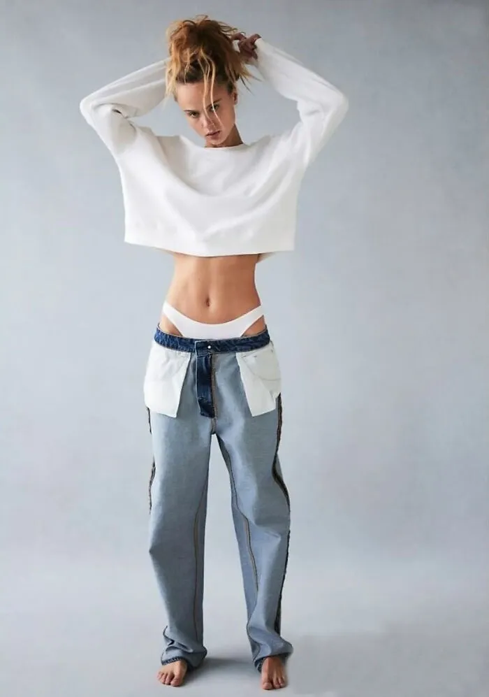I Refuse To Accept That This Styling Choice Is Anything But A Commentary On How Deep The Pockets On Women's Jeans Could Be And How Small And Useless They Insist On Making Them Instead