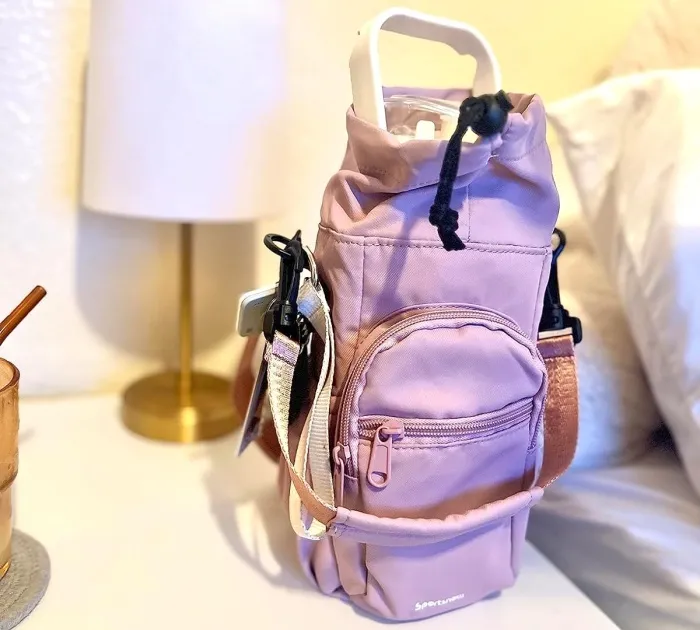 Keep Your Essentials In One Place With <a Style="Display:inline;" Href="Https://Www.amazon.com/Dp/B0c5mqlhyd?ascsubtag=7597226%2c5%2c29%2cd%2c0%2c0%2cbf-Web-Hf%2c0%3a0%2c42194237%2c0%2c0%2c0&th=1&linkcode=ll1&tag=bpwombat-20&linkid=911c2fb11c07690cbb5a481192c590e2&language=en_us&ref_=as_li_ss_tl" Target="_blank"><span Style="Font:inherit;color:#d74b1f;"> The Sportsnew Water Bottle Carrier </Span>