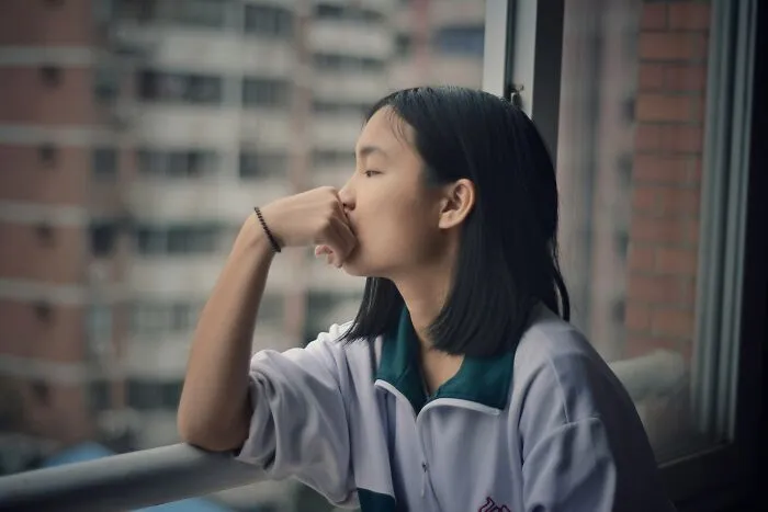 Woman looking and thinking