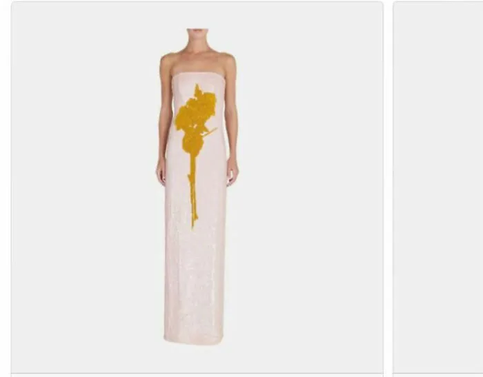 This Looks Like Someone Smeared Mustard All Over A Bedsheet