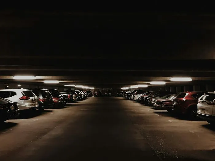 Vehicles parked inside parking lot