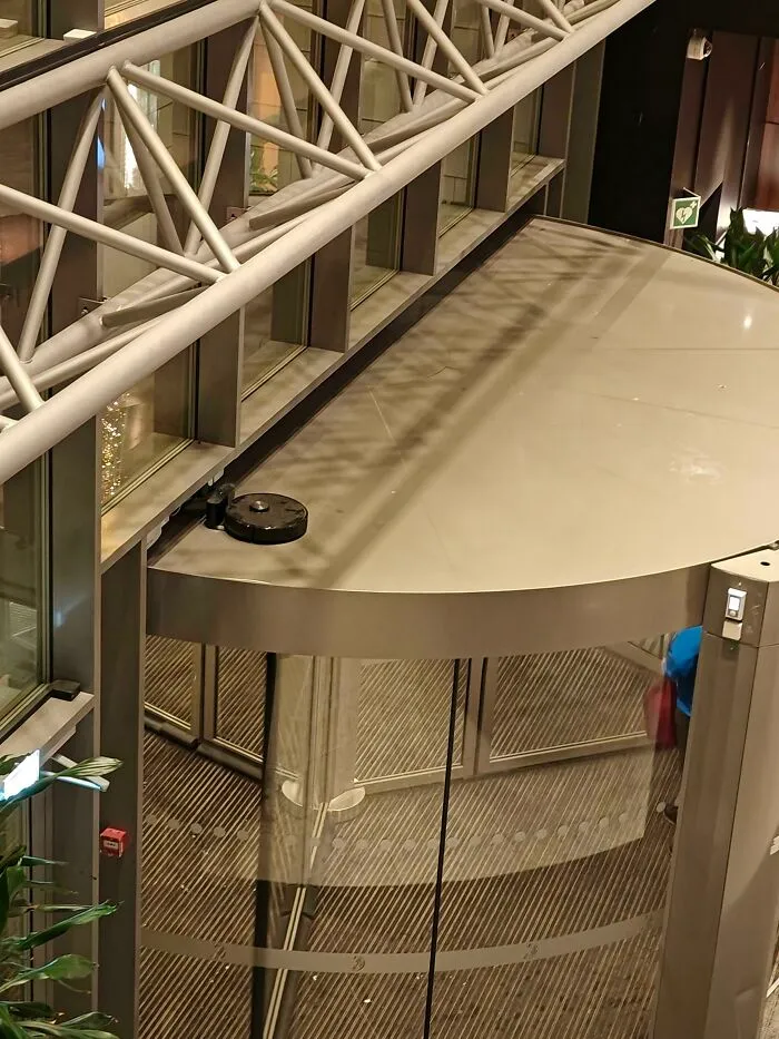 Just Saw This Roomba On Top Of A Norwegian Mall Door