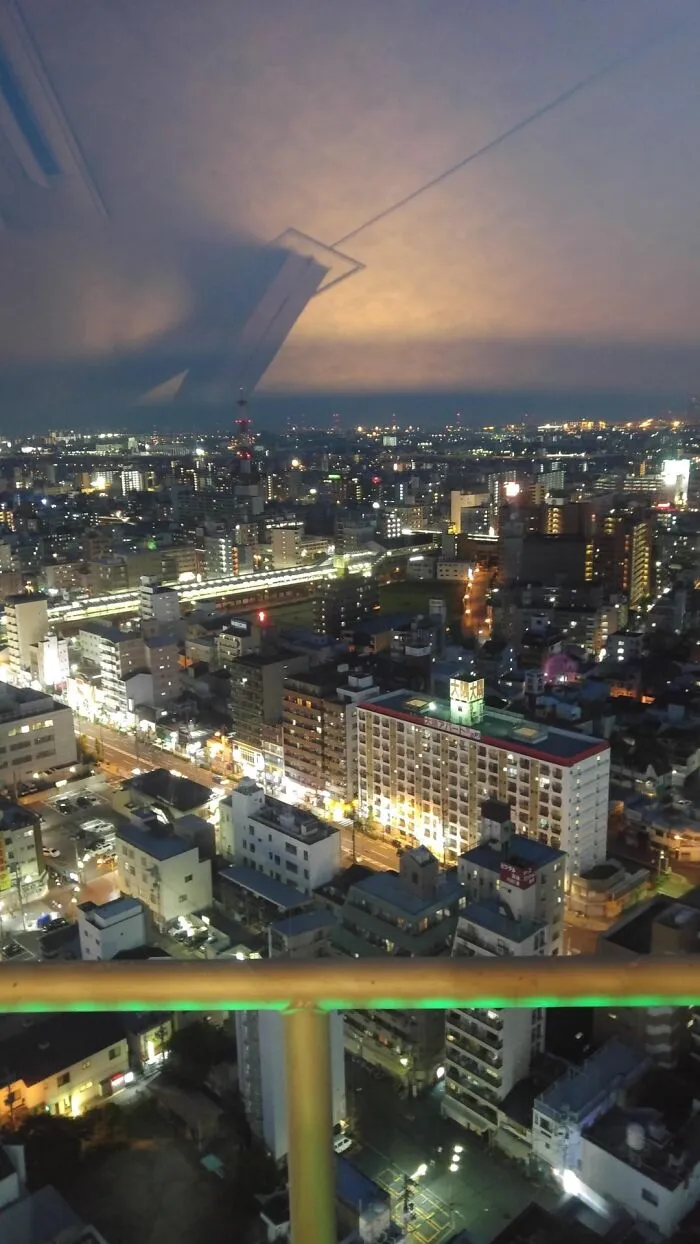 Reflection On Window Looks Like Massive Spaceship Landing