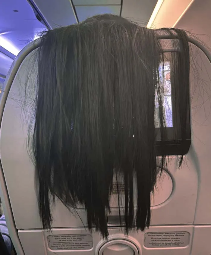 Trying To Watch A Movie On The Airplane