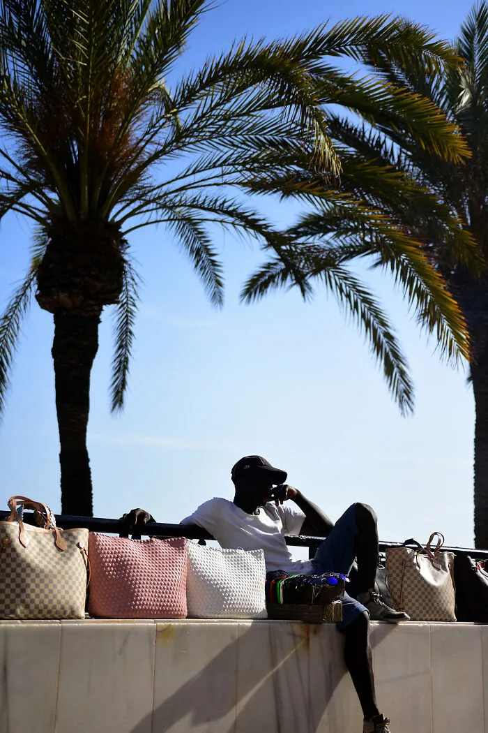 My 39 Photographs Of “Looky Looky” Men And Other Beach Scenes