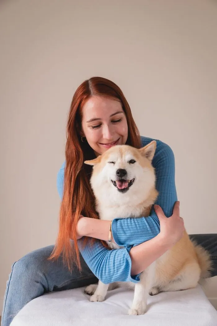Cheeky Eyewink From Charlie The Shiba Inu While Enjoying A Hug From Mom