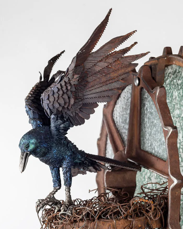 One Of The First Birds I Made Was This Blackbird, Which Has A Ceramic Body And Saw Blades For Wings.  The Stand Is Made From Rusty Old Farm Implements