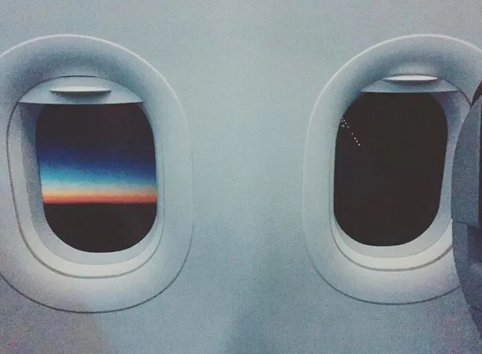 The Sun Completely Set Through My Right Window, But Was Still Setting In The Left Window During My Flight