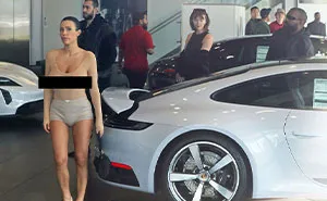 Bianca Censori Goes Porsche Shopping With Kanye West While Wearing An All-Nude Set